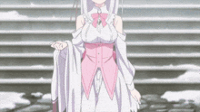 a girl in a white and pink dress is standing in front of stairs