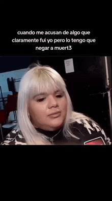 a woman with white hair is wearing a black and white shirt with joyas de internet written on it