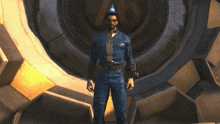 a man wearing a party hat stands in front of a large gear