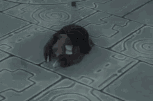 a video game character is laying on a brick floor with a swirl pattern on it