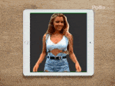 a tablet with a picture of a woman on the screen and the word pollo.ai on the bottom
