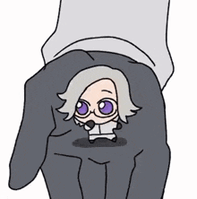 a person is holding a small cartoon character in their palm .