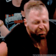 a close up of a man 's face with the words tovegasandback in the corner