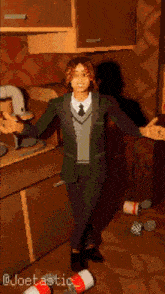 a pixel art of a man in a suit and tie with the name joestatic on the bottom right