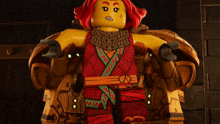 a lego figure with red hair and a red and green outfit