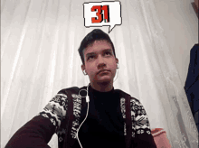 a young man wearing headphones has a speech bubble with the number 31 above his head