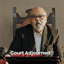 a man sitting in a chair with the words court adjourned on the bottom