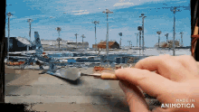 a person is painting a landscape with the words made in animotica below them