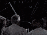 two men are standing next to each other and one of them is saying it 's too big to be a space station