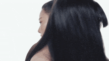 two women are standing next to each other and one has a question mark on her forehead