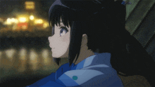 a girl with long black hair is wearing a blue kimono