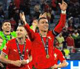 a soccer player wearing a medal that says " champions league "