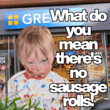 a child with chocolate on his face is standing in front of a grocery store