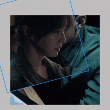a picture of a man and a woman with a blue border