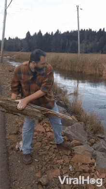 Throw A Log Into The River Viralhog GIF - Throw A Log Into The River Viralhog Throw Away GIFs