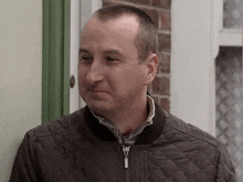 Kirk Turning His Head And Smiling Coronation Street GIF - Kirk Turning His Head And Smiling Coronation Street Corrie GIFs