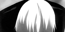 a close up of a person 's hair with a black background