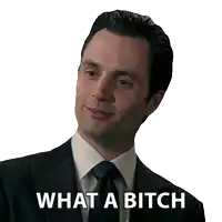 a man in a suit and tie has the words what a bitch written on his face