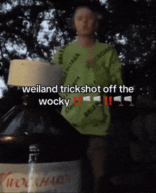 a woman in a neon green balenciaga shirt is standing next to a bottle of wocky