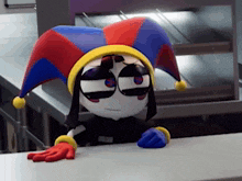a cartoon character is wearing a jester hat and gloves