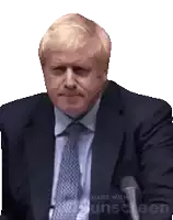 a man in a suit and tie with the words made with unscreen at the bottom