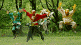 a group of ninjas are jumping in the air with their arms outstretched