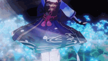 a girl in a blue dress is dancing in a dark room