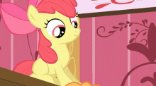 a cartoon pony with a pink mane and tail is looking out of a window