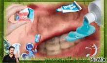 a tube of colgate toothpaste is being poured into a person 's mouth