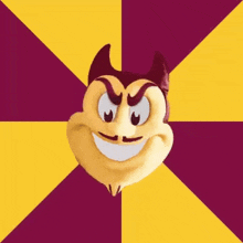 a yellow and purple square with a cartoon face in the middle