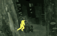 a yellow silhouette of a person standing in the dark