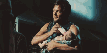 Daryl Dixon Baby GIF - Daryl Dixon Baby Milk GIFs