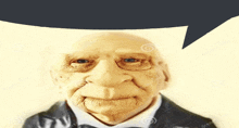 a statue of an old man with a speech bubble over his head
