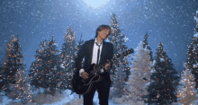 playing the guitar keith urban ill be your santa tonight feeling it snowing