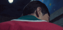 a close up of a man 's face and neck