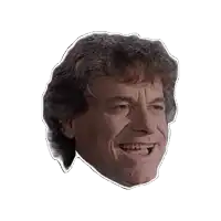 a close up of a man 's face with a sticker on it