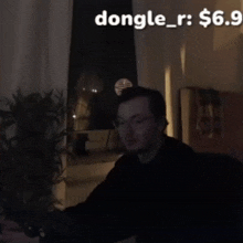 a dark room with the words dongle_r : $ 6.9 on the bottom