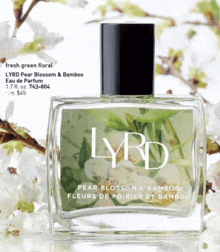 a bottle of lyrd pear blossom & bamboo perfume