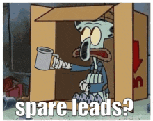 squidward from spongebob squarepants is sitting in a cardboard box