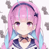 a girl with pink hair and blue streaks is smiling in front of cats