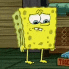 spongebob squarepants is standing in front of a box that says thee