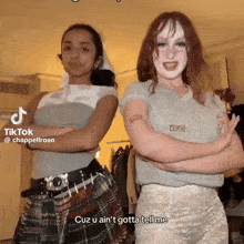 two girls standing next to each other with one saying cuz u ain 't gotta tell me ..