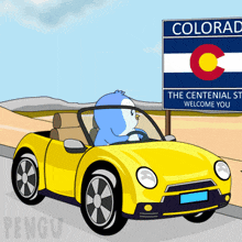 a cartoon of a penguin driving a yellow car in front of a sign that says colorado