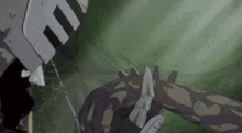 a close up of a person 's arm with spikes on them