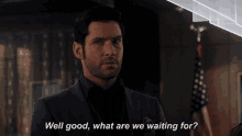 a man in a suit is saying well good what are we waiting for