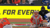 a baseball player with the number 14 on his jersey