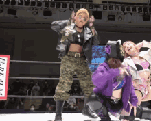 a wrestling ring with a sign that says " liberty " on it