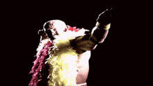 a man with feathers around his neck is wearing a yellow shirt