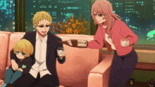 a man is pouring a bottle of alcohol into a woman 's cup