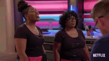 a netflix ad shows two women laughing and talking